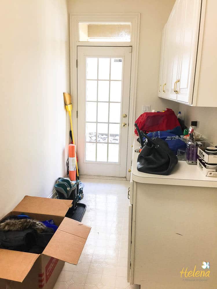 white hallway with white cabinetry