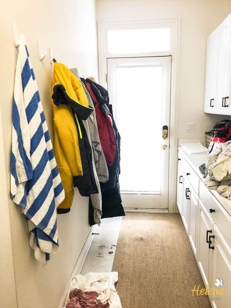 white hallway with white cabinetry