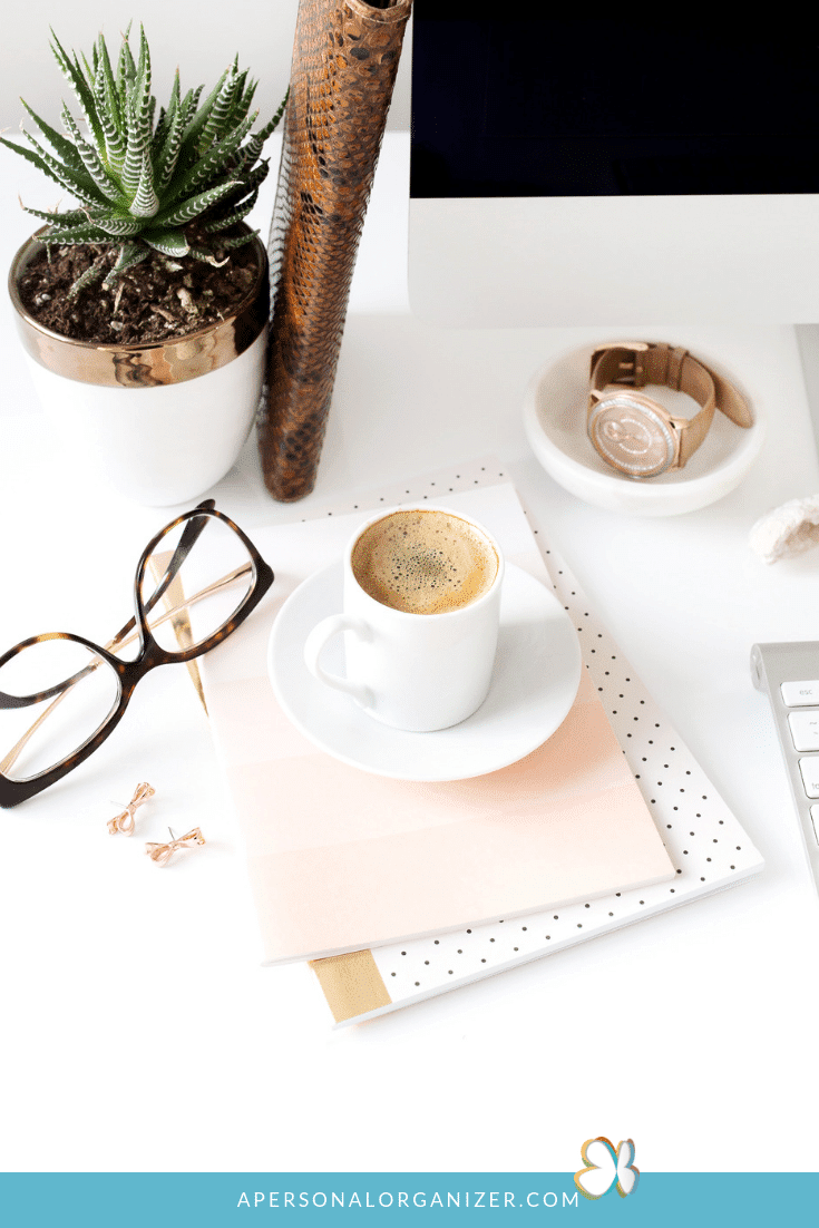 de-clutered organized rose gold and white desk